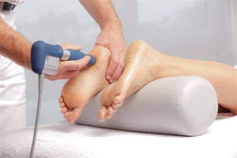 Shock Wave Therapy being applied to a patient's heel