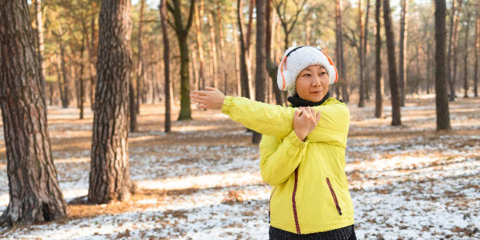 Person stretching at the start of the day